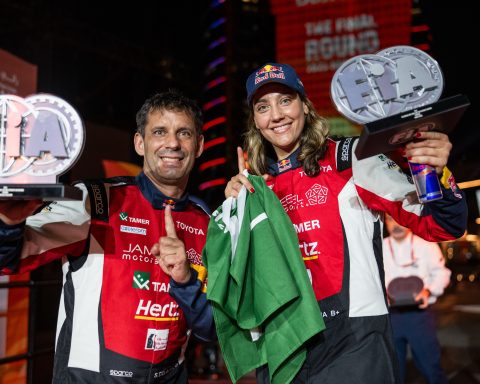 Dania Akeel and co-driver Sebastien Delauney with FIA Middle East Baja Cup Champion trophies _ Photo_ MCH Photo