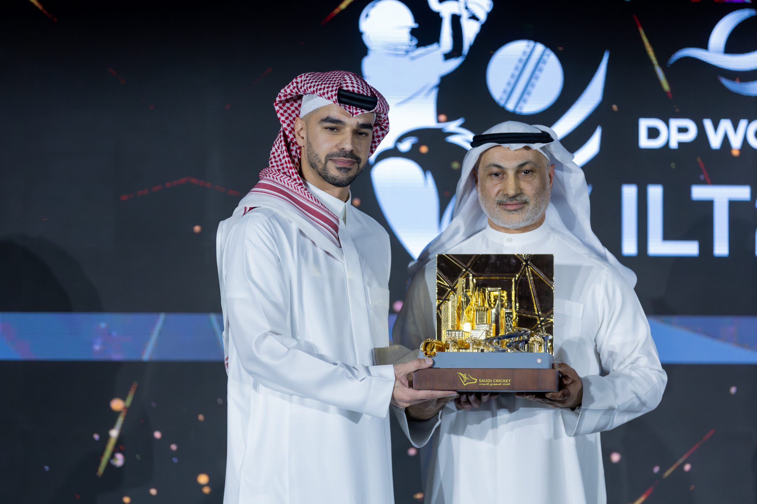 Chairman Saudi Arabian Cricket Federation HRH Prince Saud bin Mishal Al Saud presents a memento to Chairman DP World ILT20 Khalid Al Zarooni during the DP World ILT20-SACF partnership celebration ceremony in Riyadh.