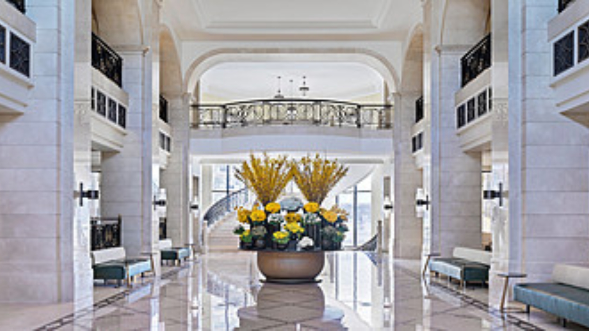 The Exterior Of Four Seasons Hotel Amman Rises Above The City, Offering A Luxury Stay In The Heart Of The Capital