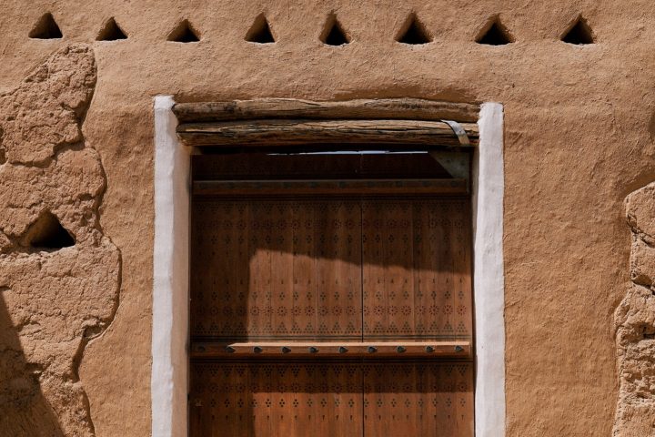 Figure 1 - A preserved Najdi doorway in historic Diriyah, showcasing the architectural details that continue to inspire Saudi design today
