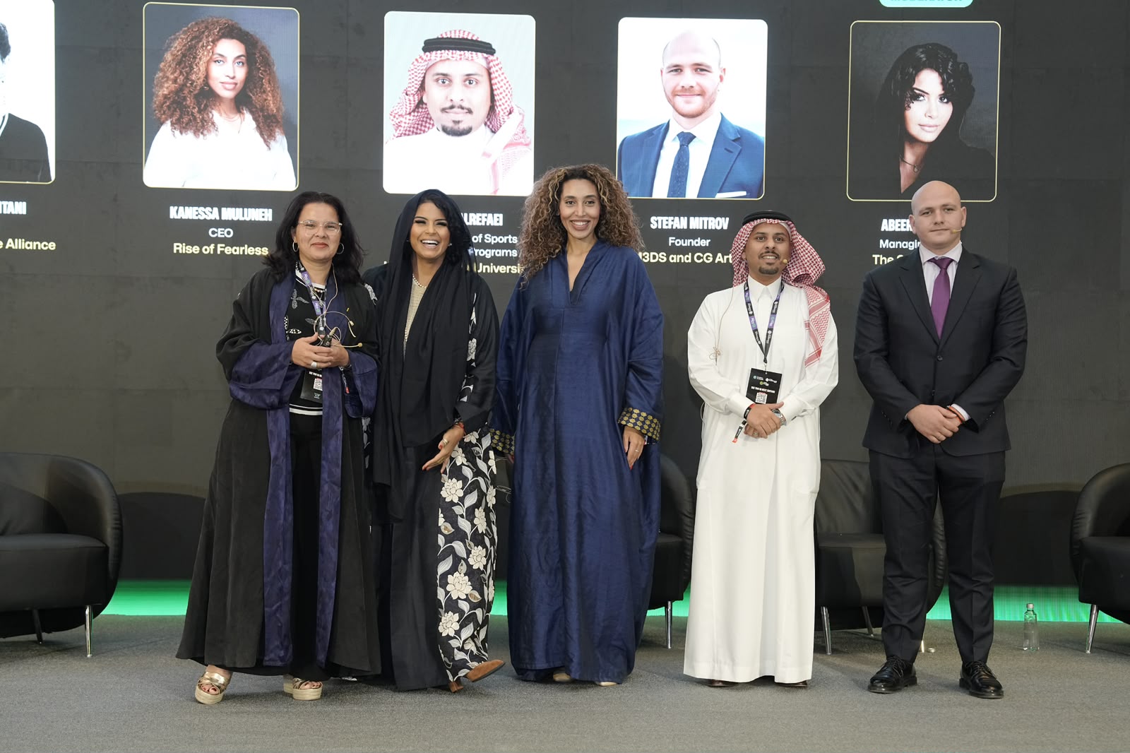 Abeer Abdalla, Managing Editor of The Saudi Times, appears with Global Games Show panelists Yasmina Kazitani, President of the Blockchain Game Alliance; Kanessa Muluneh, CEO of Rise of Fearless; Ammar Alrefaei, Dean and Director of Sports Management Programs at King AbdulAziz University; and Stefan Mitrov, Founder of M3DS and CG Artist, following a discussion on community-driven gaming.