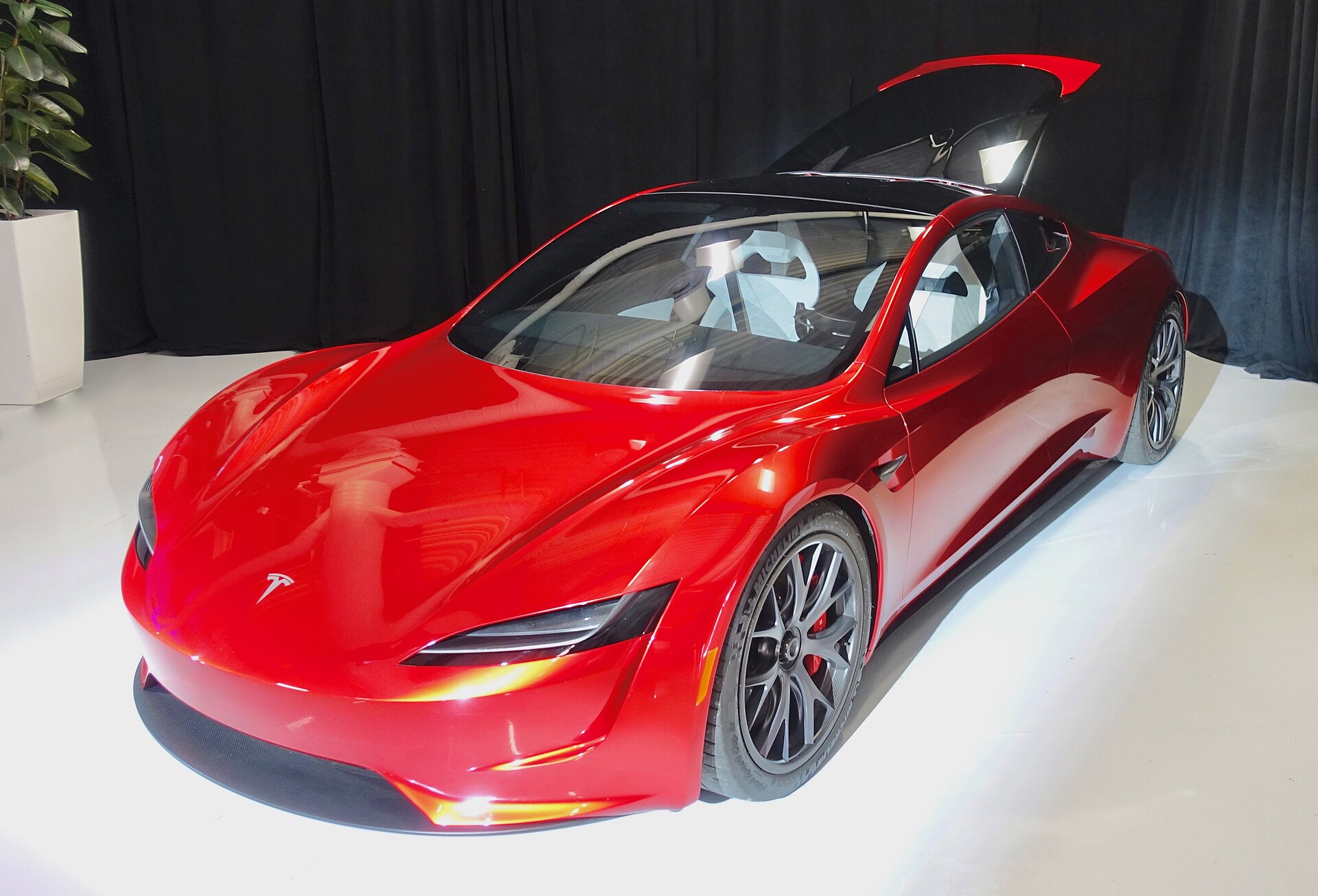 Tesla unveils new Roadster with rocket-style thrusters, Musk targets 2028 production