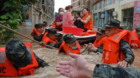 الفيضانات-تودي-بحياة-21-شخصاً-في-الصين-…-ورحيل-الآلاف-عن-منازلهم